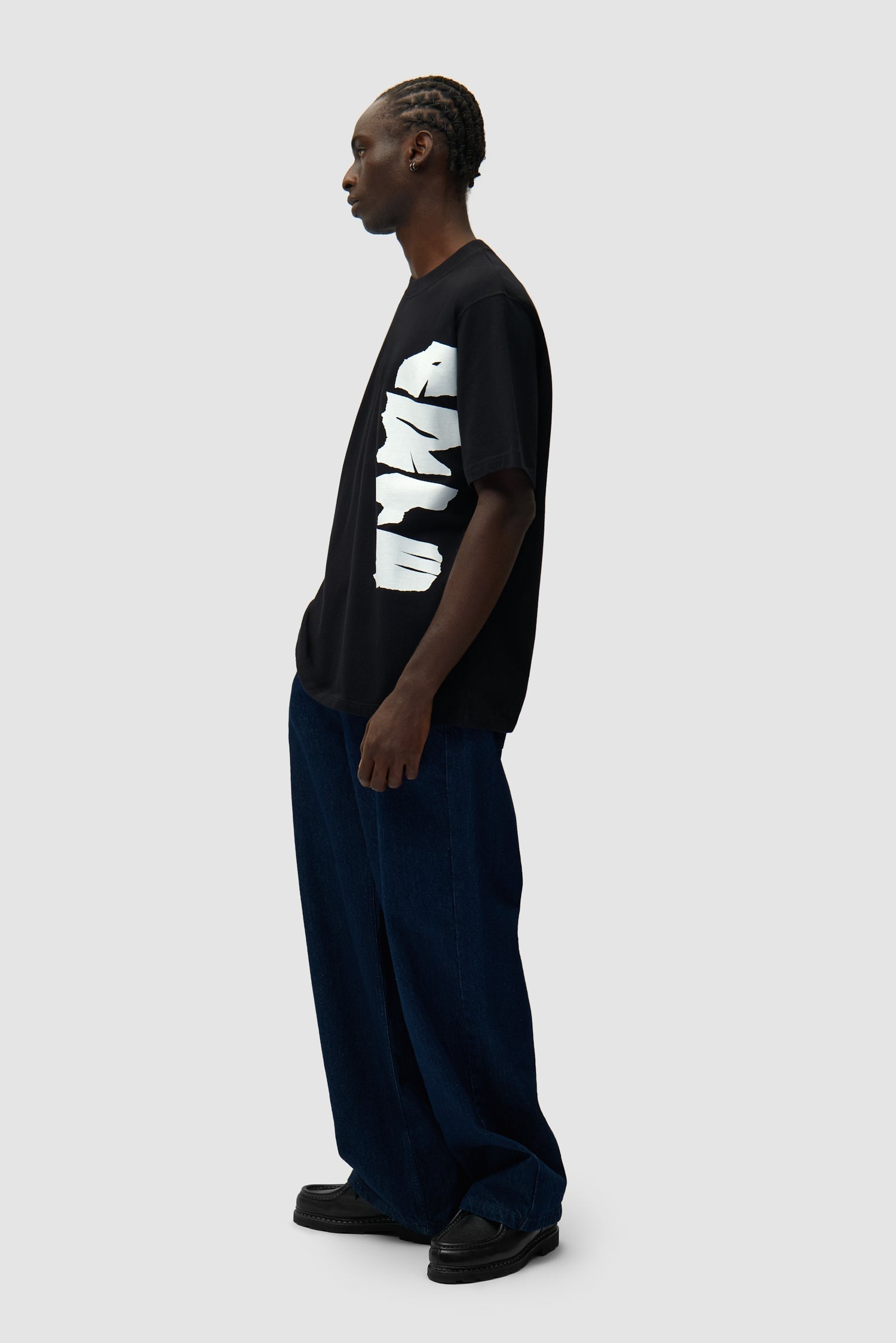 Pantalon à poche avec logo circulaire - Denim brut